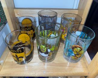 Saints lowball glasses and Shrek collector glasses