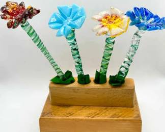(4) Glass Flowers & Wooden Base