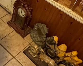 Some old clocks and sailor figures