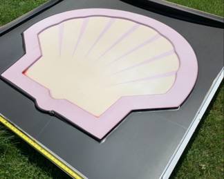 Back of large gas station Shell sign