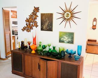 Lots of beautiful MCM colored glass!
Sunburst clock and other fun decor!
Console stereo cabinet
Can be purchased with or without record player, CD player, etc.