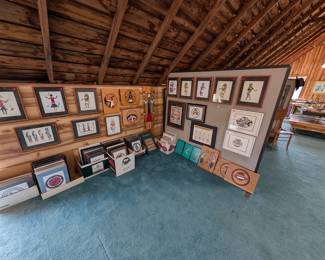 Art studio with hundreds of art pieces that included handmade benches, each with their own painted design that includes a story behind the design origin, drawings, paintings, wall hangers, and so much more.