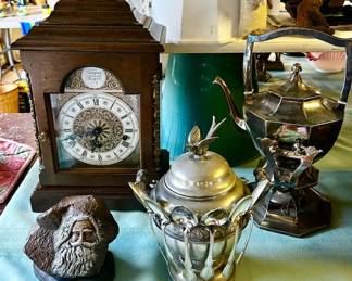 Zeeland, MI mantle clock,, silver plate teapot on stand, signed resin Santa, large silver plate sugar bowl with spoons