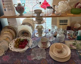 tea cups, plates, compote dish, glass baskets, candy dishes