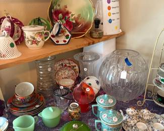 tea cups, sugar and creamers