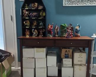 The Fantastic Dragons and the Quest for the Crystal have boxes and certificates of authenticity right under where I have them displayed.