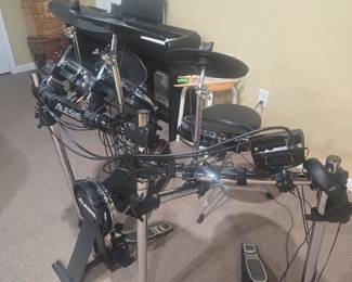 Alesis drum set with amplifier sold separately