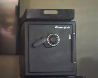 Pretty much new Sentry safe. Other safes and gun safes as well at the sale!