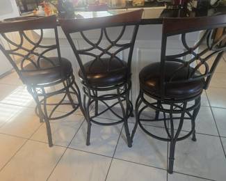 Bar stools sold as a set.