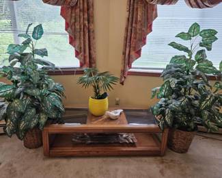 glass top coffee table and silk flowers