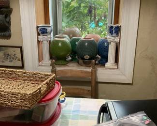 Upside down planters, candle sticks and rattan tray