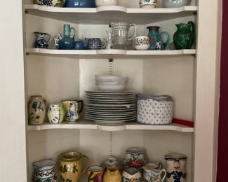 Plates and a variety of pitchers