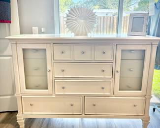 Tall white dresser with 11 drawers - 6 drawers concealed behind cupboard doors.