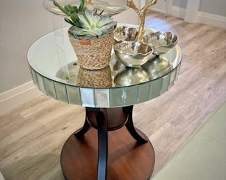 Second of two wood circular end tables