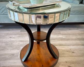 One of two wood circular end tables
