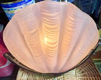 Wall lamp with translucent pink shell