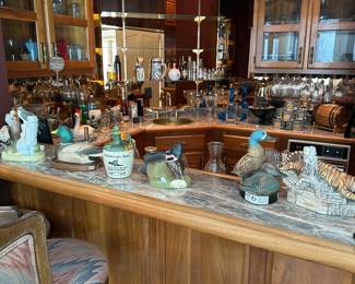 Bar and liquor collection, ducks, Unlimited beam bottles
