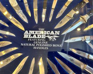 American blade store display full of pocket knives