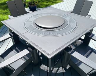 H38 - $950. Priced together as Photographed. Solo Stove Bonfire Fire pit with Lid. Removable Base plate & Ash Pan. Stand and cover. Surround Extend & Surround Surface. 4 - 1903 Terraflame Adirondack Chairs.