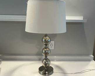 H128 - $30. Table Lamp. 27" tall. Shade is in great condition.