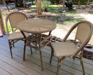 H19 - $150. Tommy Hilfiger Cafe Set. Small round table & 2 chairs. Table is 27.5" round x 29.5" tall. Chairs are 19" wide x 34" tall.