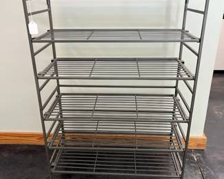 H103 - $30. Adjustable shelving unit / shoe storage. Measures 26.5" x 12.5" x 37" tall.