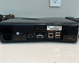 H66 - $80. xbox360s. Includes 2 controllers & 14 games.
