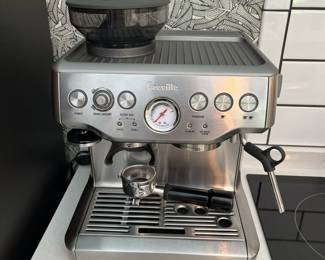 H57 - $350. Breville Barista Express Espresso Machine with accessories and cleaning kit.