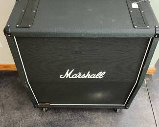 H113 - $500. Marshall 1960A 300 watt Angled Stereo Cabinet. Has small hole and some discoloration. Measures 30" wide x 14" deep x 32" tall.