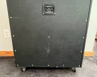 H113 - $500. Marshall 1960A 300 watt Angled Stereo Cabinet. Has small hole and some discoloration. Measures 30" wide x 14" deep x 32" tall.