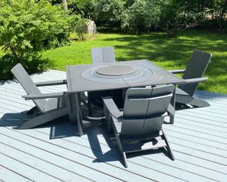 H38 - $950. Priced together as Photographed. Solo Stove Bonfire Fire pit with Lid. Removable Base plate & Ash Pan. Stand and cover. Surround Extend & Surround Surface. 4 - 1903 Terraflame Adirondack Chairs.
