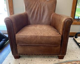 H79 - $300. Pottery Barn Leather Chair. Measures 32" wide x 35" deep x 31" tall.