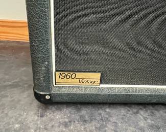 H112 - $600. Marshall 1960 Vintage Angled Extension Cabinet. No holes. No discoloration. NOT on wheels. Measures 29" wide x 14" deep x 29.5" tall.