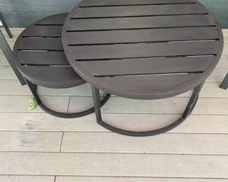 H16 - $150. Pottery Barn Nesting Tables for Patio or Screened in Porch. Large Table is 36" round x 19.5" tall. Smaller table slides underneath.