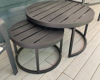 H16 - $150. Pottery Barn Nesting Tables for Patio or Screened in Porch. Large Table is 36" round x 19.5" tall. Smaller table slides underneath.