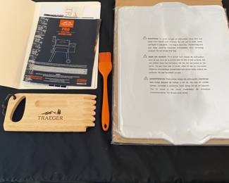 H42 - $500. Traeger Pro 575 Pellet Grill. Includes 2 pellet containers, traeger grill scraper, grill mat, 2 drip plans. Excellent almost new condition!