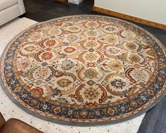 H81 - $225. Pottery Barn Eva Persian Rug Red. 8' round. 2023. 100% Wool.