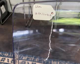 H84 - $475 SET. Ikea Tranebo Dining Table. Measures 36.5" wide x 87" long x 30" tall. Overall very good condition - does have some surface marks. 6 Ikea Tobias Clear & Chrome Plated Chairs. 5 are in very good condition. 1 has a crack - still useable.