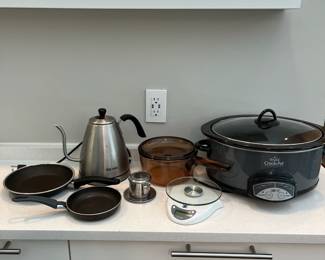 H63 - $10. Aroma Electric Tea Kettle. $10 Crockpot. $5 Taylor Food Scale. $5 Pair of small non stick pans. $5 Stainless tea strainer.