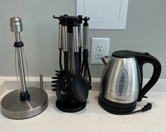 H64 - $25. All Photographed. Stainless Papertowel Holder, Kitchen Utensil Set, Hamilton Beach Electric Kettle.