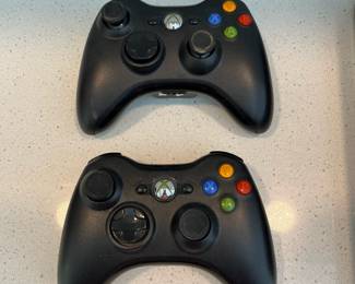 H66 - $80. xbox360s. Includes 2 controllers & 14 games.