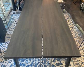 H84 - $475 SET. Ikea Tranebo Dining Table. Measures 36.5" wide x 87" long x 30" tall. Overall very good condition - does have some surface marks. 6 Ikea Tobias Clear & Chrome Plated Chairs. 5 are in very good condition. 1 has a crack - still useable.