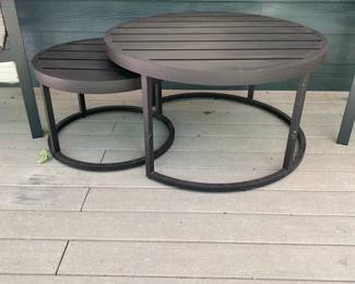 H16 - $150. Pottery Barn Nesting Tables for Patio or Screened in Porch. Large Table is 36" round x 19.5" tall. Smaller table slides underneath.