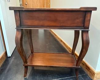 H99 - $45. Small Ethan Allen Side Table. Measures 12" wide x 22" deep x 25" tall.