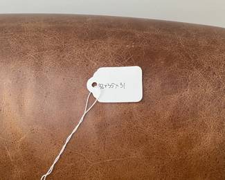 H79 - $300. Pottery Barn Leather Chair. Measures 32" wide x 35" deep x 31" tall.