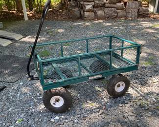 H11 - $70. Ground Works Garden Cart. Model GW800. Steel Cart with sides that fold down.
