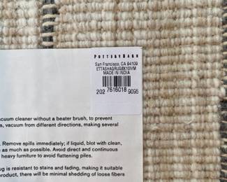 H83 - $150. Pottery Barn Etta Easy Care Shag Rug. 8' x 10'. This rug has the most wear of them all.