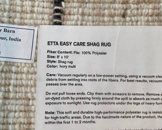 H83 - $150. Pottery Barn Etta Easy Care Shag Rug. 8' x 10'. This rug has the most wear of them all.
