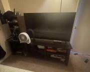 TV, fan, entertainment unit, board games.