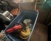 Extension cord, tree trimmer, coin counter, lots of misc item.